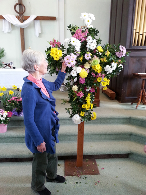 Andover Congregational Worshippers Build a Flowered Cross for Easter