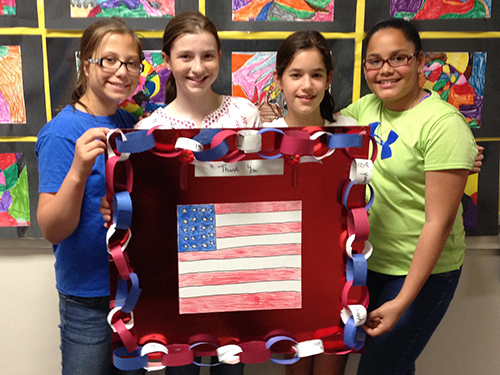 AE/MS Sixth Grade Thanks Veterans with Posters