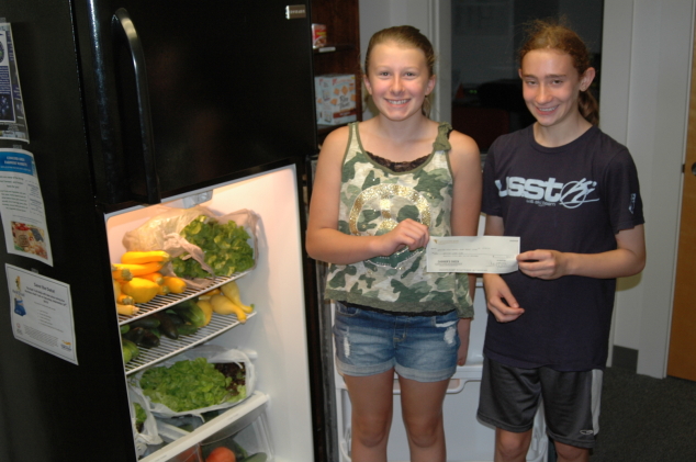 Andover Girl Scouts Donate Cookie Proceeds to Food Pantry
