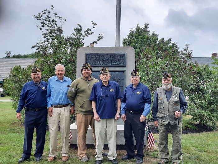 American Legion Members Raise Flag Donated in Memory of Clyde Currier