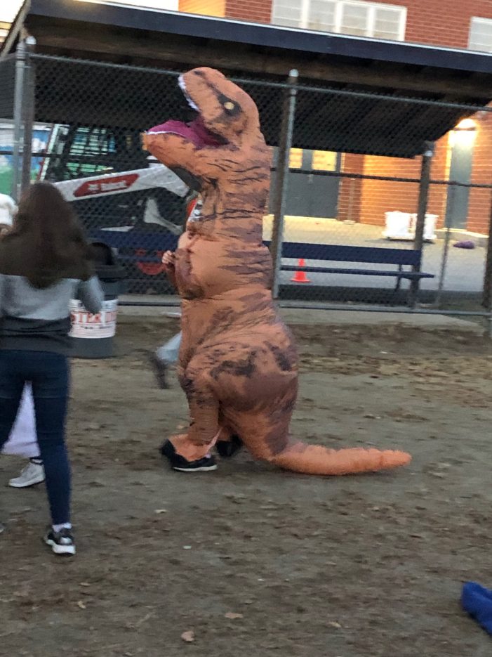 Student Sports Dinosaur Costume at AE/MS Movie Night