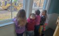 Preschoolers Watch Pavers at Work from School Window