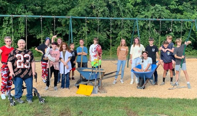 AE/MS Class of ’23 Helps Spread Wood Chips on Playground