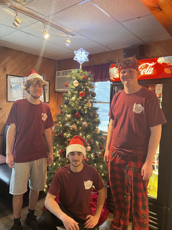 Pizza Chef Staff Gathers around their Holiday Tree