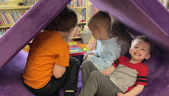 Young Readers Enjoy Andover Library’s Play Couch