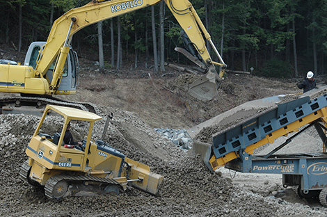 Road Agent Crushing Gravel at the Transfer Station