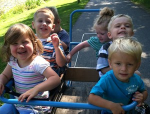 Imagination Inn youngsters out for a ride: (left, front to back) Mason Hardie, Liam Duchesne, and Johnathan Pollard. (Right) Titus Chenette, Chase Giampa and Olivia Giampa. Photo: Jocelyn Tanner