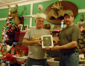 Club president Gordy Ordway (right) presents an Appreciation Award to Marty Judd.