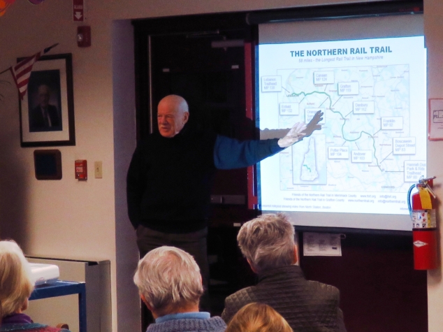 At a meeting sponsored by the Andover Institute, about 35 people learned more about Andover's hiking trails from Alex Bernhard (shown here talking about the Northern Rail Trail), Lee Carvalho, Dave Pilla, and Paul Currier. Photo: Larry Chase