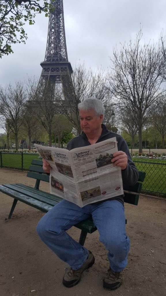 Doug Phelps' wife Alita captured this photo of him relaxing in front of the iconic French landmark on their recent trip to Paris.