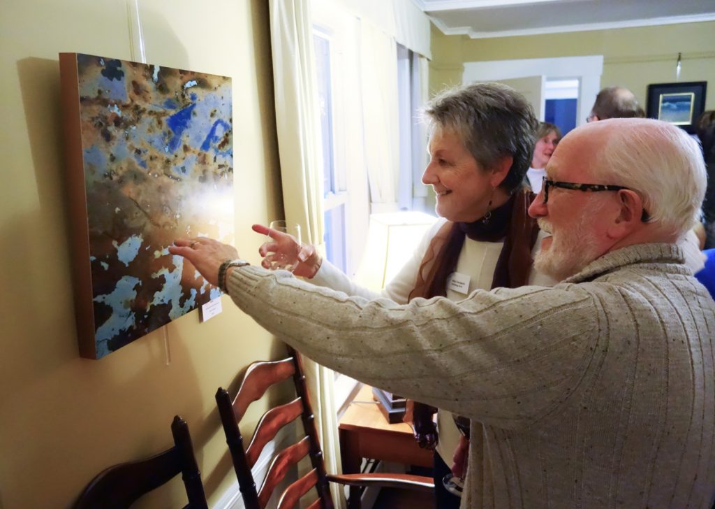 Mary Gerakaris of Canaan, NH discussing her Best of Show “Cover” with Loren Howard of North Sutton, NH. Photo: Jean Connolly