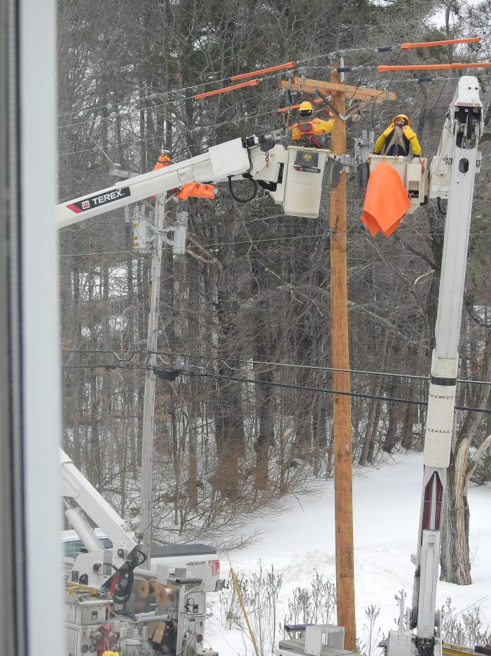 NHEC Installs a New Utility Pole on Chase Hill Road