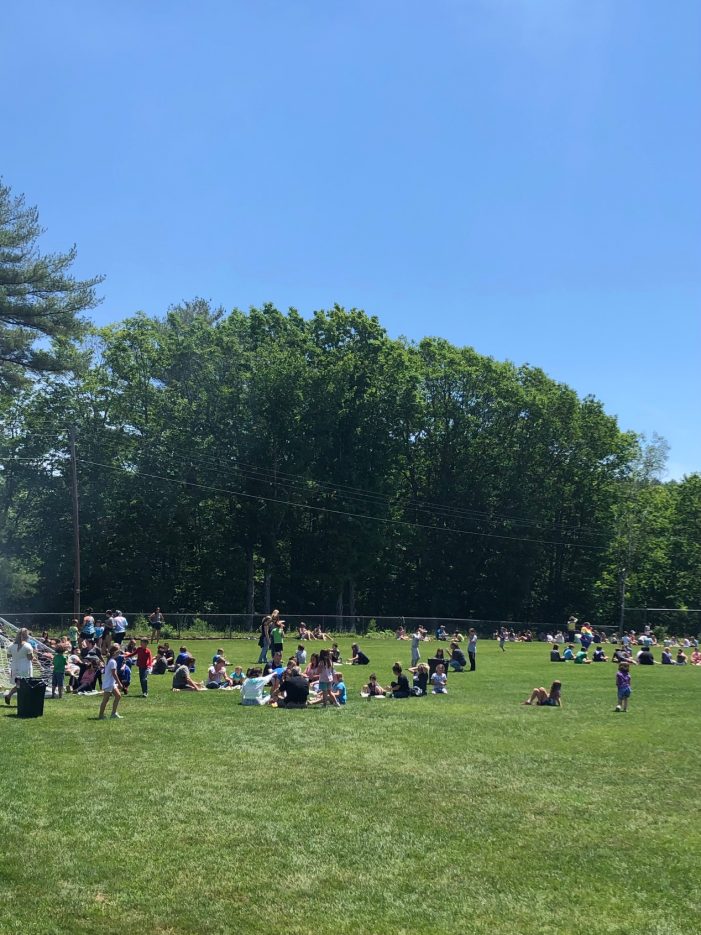 Elementary School Students Enjoy a BBQ Lunch on Last Day of School