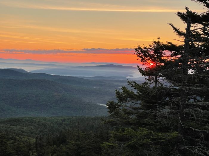 Ragged Mountain Vista Offers Serene View of Sunrise 