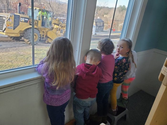 Preschoolers Watch Pavers at Work from School Window