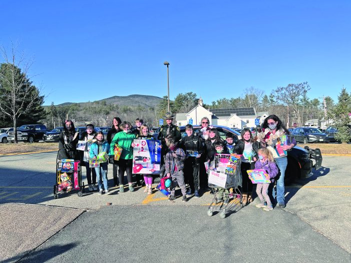 AE/MS Students Help Stuff Local Trooper’s Car with Donated Toys