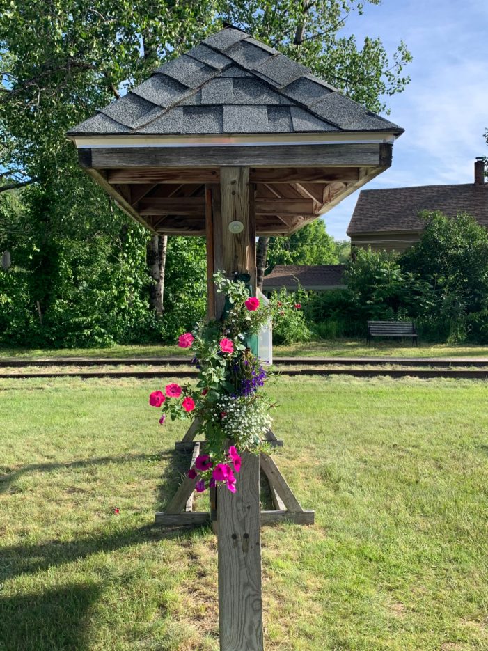 Rail Trail Rider Thanks Garden Club for Beautifying Potter Place Kiosk