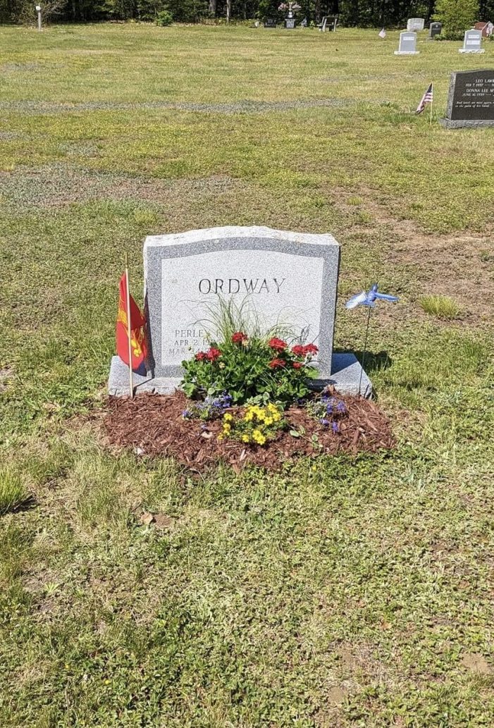 Firefighter Recognizes Past Members with Flags Placed on Graves