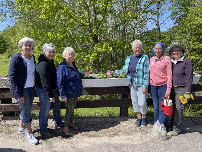 Fortnightly Club Maintains Flower Boxes on Maple Street Bridge