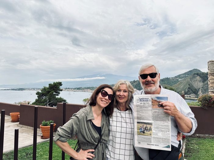 The Ratzkis Hold the Beacon against Backdrop of Mt. Etna