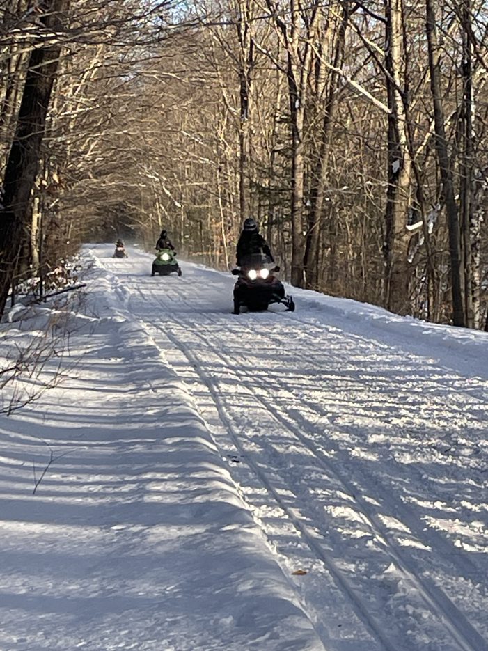 Snowmobiles Run Free on Rail Trail in Andover