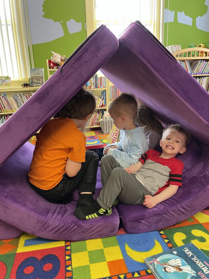 Young Readers Enjoy Andover Library’s Play Couch