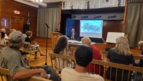 Architect Jay Barrett Addresses Audience at Wilmot Town Hall