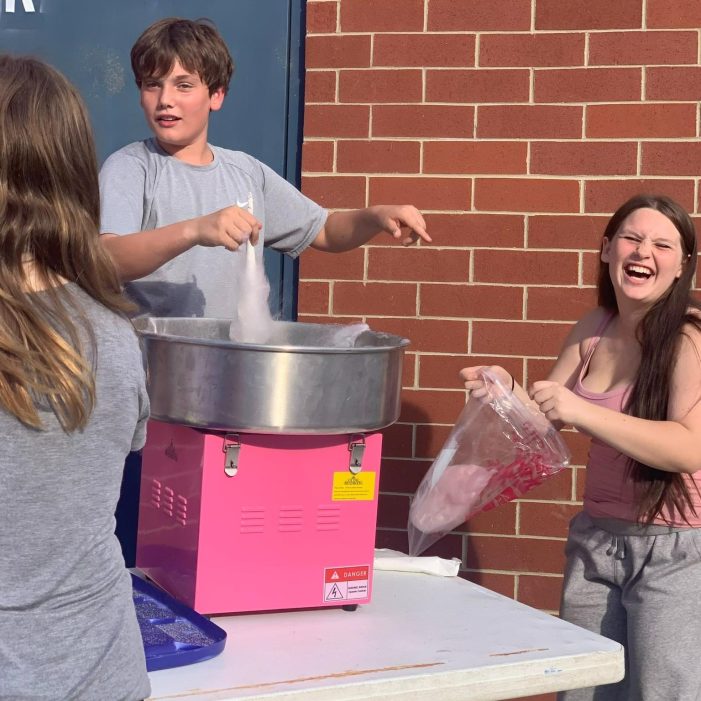 Eighth Graders Raise Funds with Movie Night