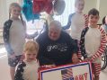 War Vet Enjoys Visit from Great-Grandkids