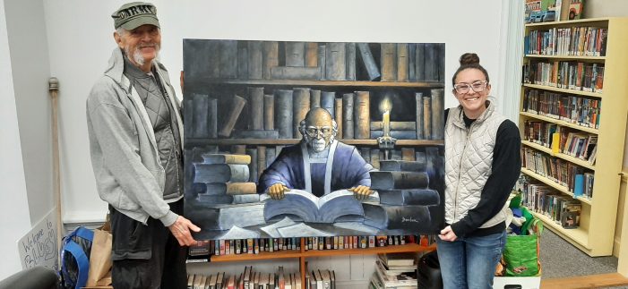Tom Barber Presents his Painting of “The Bibliophile” to Andover Libraries